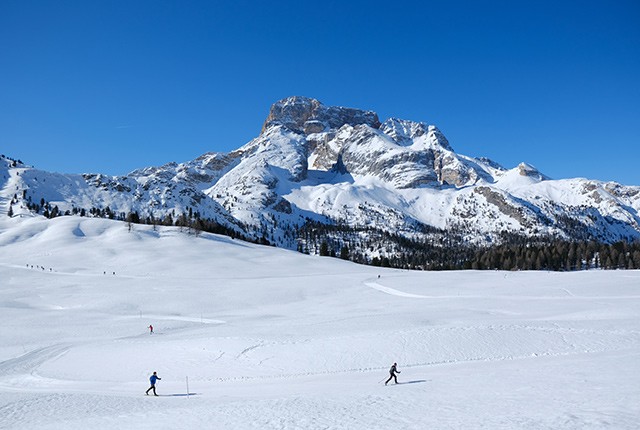 Winter landscape cross-country skiers Piazza Prato plateau, Dolmites, Italy. Wintercamping Österreich