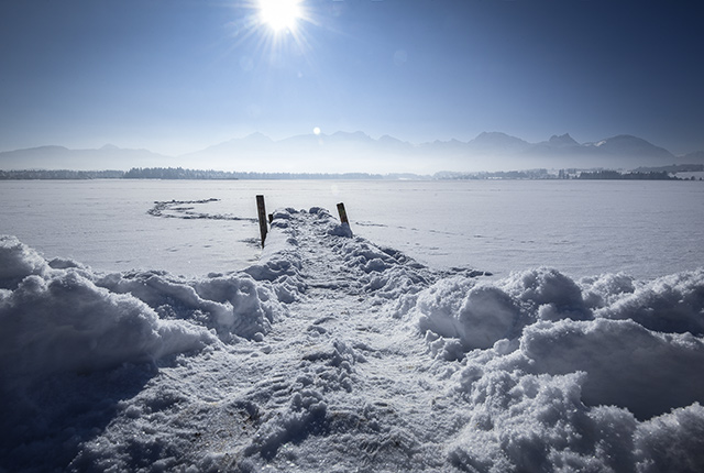 Winter scene Bavaria Hopfensee. Wintercamping Österreich